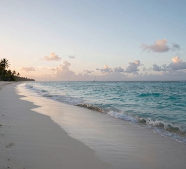 A peaceful landscape photograph of a quiet Caribbean / Anglophone Caribbean coastline at dawn, featuring soft sand and gentle turquoise waves, representing mental clarity and tranquility.
