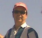 a man in a red hat and a blue shirt