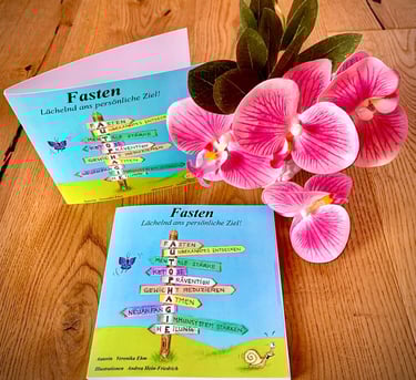 a book with a flower and a bookmark on it
