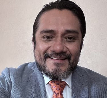 Professional psychologist smiling for a photo in formal attire