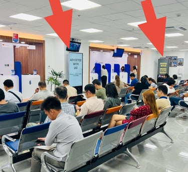 alt="Visa Center Advertising in waiting area"