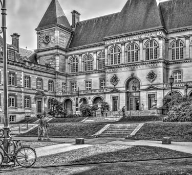 a bicycle parked in front of a large building