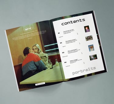 Open spread of Spiral film photography magazine showing a table of contents and portrait of a couple.
