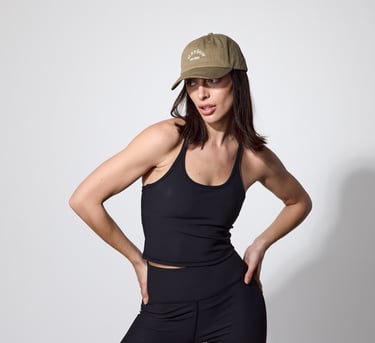 Fashion photography - a woman in a black top and a hat