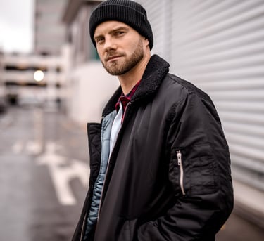 Fashion photography - a man in a black jacket and beanie