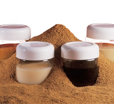 a variety of spices and spices in a pile of sand