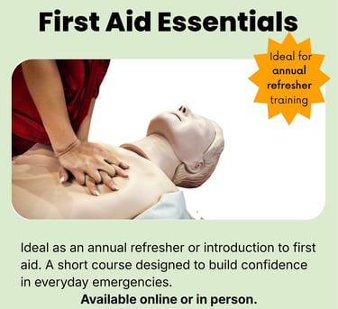 Someone learning CPR on a training manikin. Hands interlinked providing chest compressions