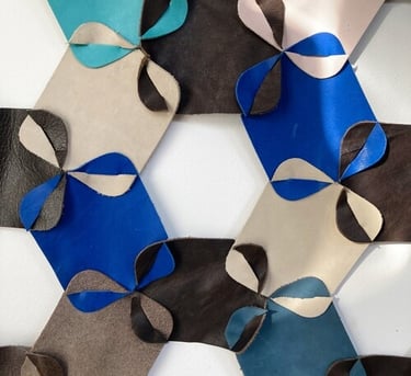 nexus is a pattern composed of identical rectangular pieces with slots, that when joined create a hexagonal negative space