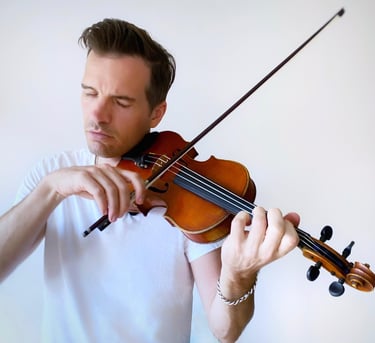 Luke Cissell playing violin