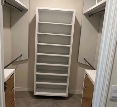 Picture of walk-in closet created by White and Wood Custom Carpentry in Orlando Florida