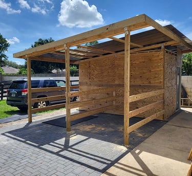 Picture of horse shed designed by White and Wood Custom Carpentry in Orlando Florida