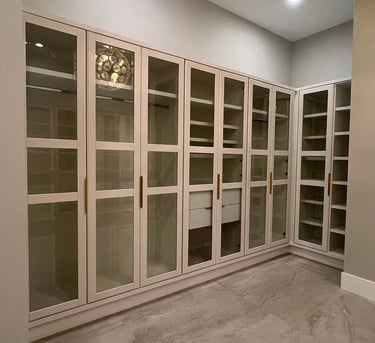 Picture of walk-in closet created by White and Wood Custom Carpentry in Orlando Florida
