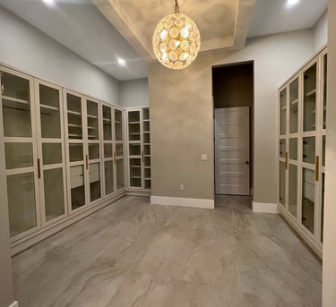 Picture of walk-in closet created by White and Wood Custom Carpentry in Orlando Florida