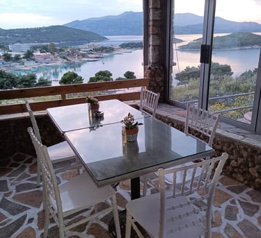 "Experience the Beauty of Ksamil's Bay and Islands at John's Guesthouse"