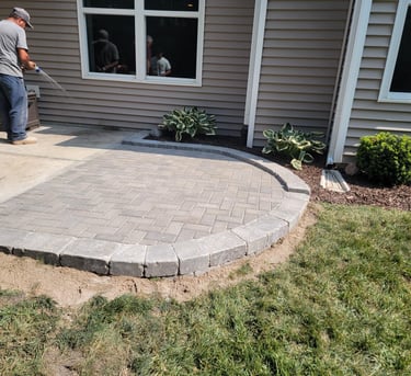 Extend your concrete patio with a paver extenstion