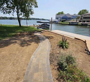 Custom sidewalk to the lake in Heritage Lake