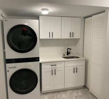 a laundry room with a washer and a washer