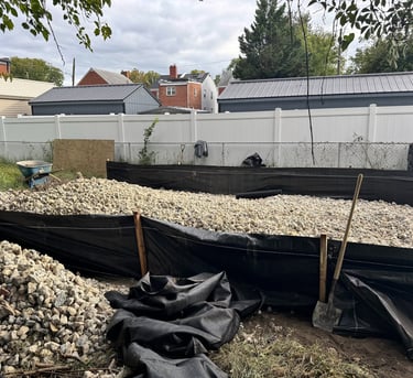 a pile of graveled rocks in a yard
