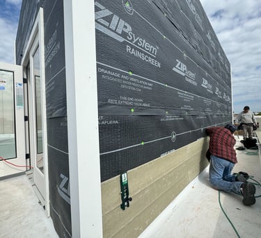 a man is working on a roof top of a building