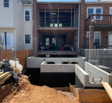 a house being built into a foundation for a home