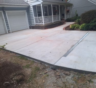 a house with a driveway with a driveway with a driveway