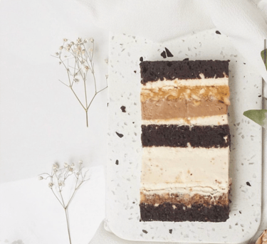 a piece of cake with a slice of cake on a plate