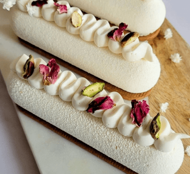 a couple of desserts on a wooden board
