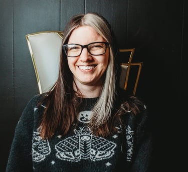 Alex Bounds smiling with glasses profile - The Nail Witchery - Missoula, MT