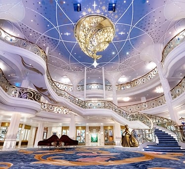 Main atrium staircase aboard the Disney Wish, Disney Cruise Line
