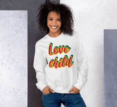 a woman wearing a sweatshirt with the words love child on it