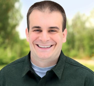 a man with a green shirt and a white shirt