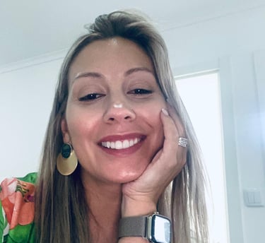 a smiling woman with a watch on her wrist