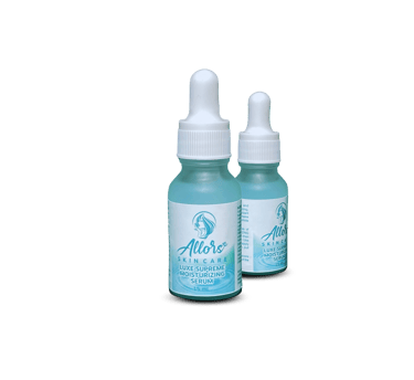 Two bottles of Allors Luxe Supreme Moisturizing Serum, featuring light blue liquid and dropper caps on white background.