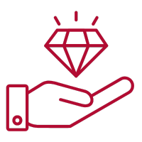 a hand holding a diamond shaped diamond in a hand