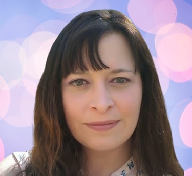 a woman with long hair and a white shirt
