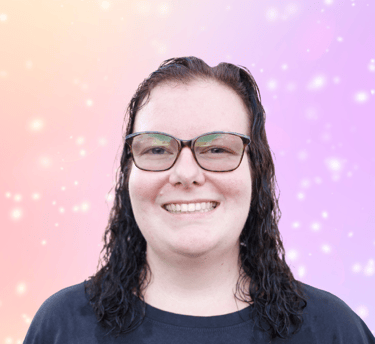 a woman with glasses and a black shirt