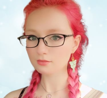 a woman with pink hair and glasses on her face