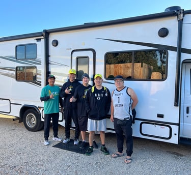 photo of some friends from college in front of a rental motorhome about to start their road trip