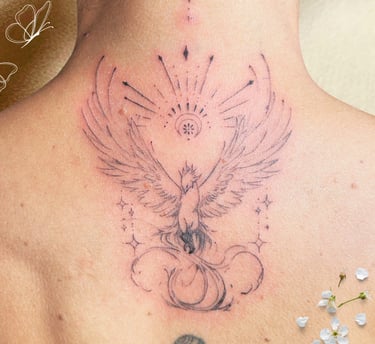 Tatouage phoenix abstrait et fin Inkorporée Vendée