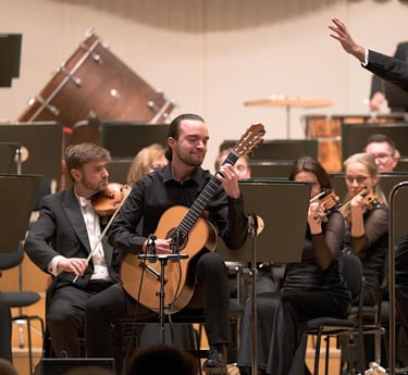 Classical guitarist Filip Babic playing with an orchestra