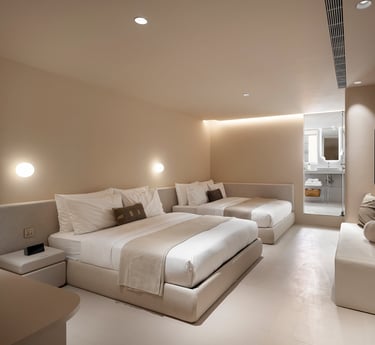 樂爾公寓 LORE Hotel 有窗附浴缸四人房，寬敞格局搭配柔和色系，是家庭與團體旅遊的理想選擇