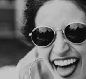 Adult laughing at astronomy joke