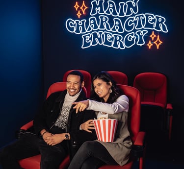 couples enjoying movie at home theatre setup