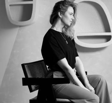 a woman sitting on a chair in a chair