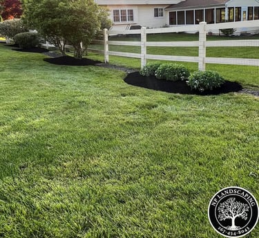 excellent landscaping and hardscaping of grass, stones and trees by NP Landscaping