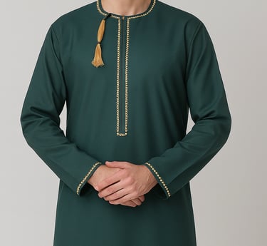 a man in a green dress with a gold tassell