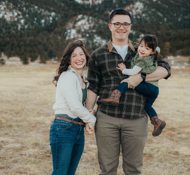 Family portrait of the owner / operators of Peaks and Pines Cleaning Service: Johnathon and Sierra, with their baby Julia.