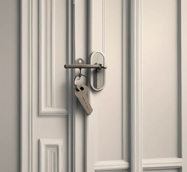 Elegant concierge handing over keys in a luxurious property setting.