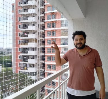 a happy customer by the installation of pigeon nets in powai mumbai