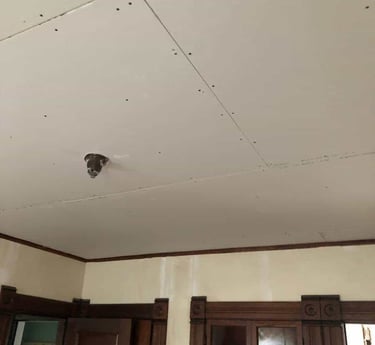 drywall hung over popcorn ceiling texture in springfield ma